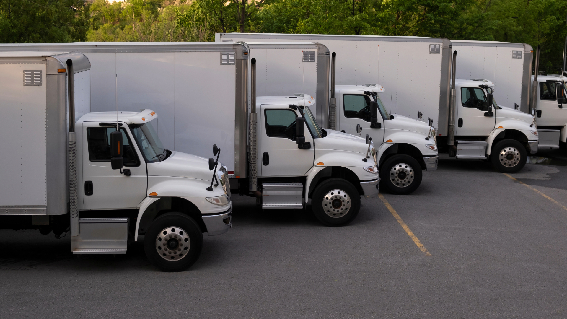 A box truck fleet about to be transported by ATC