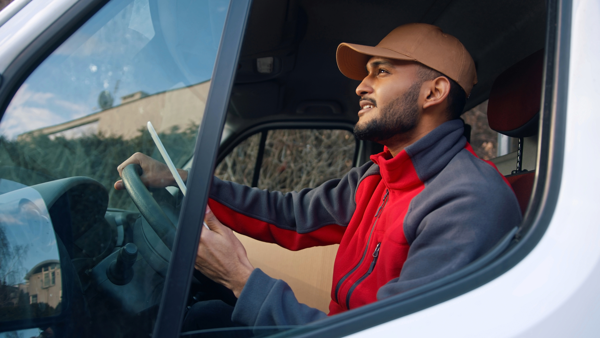 ATC driver delivering boom truck fleet