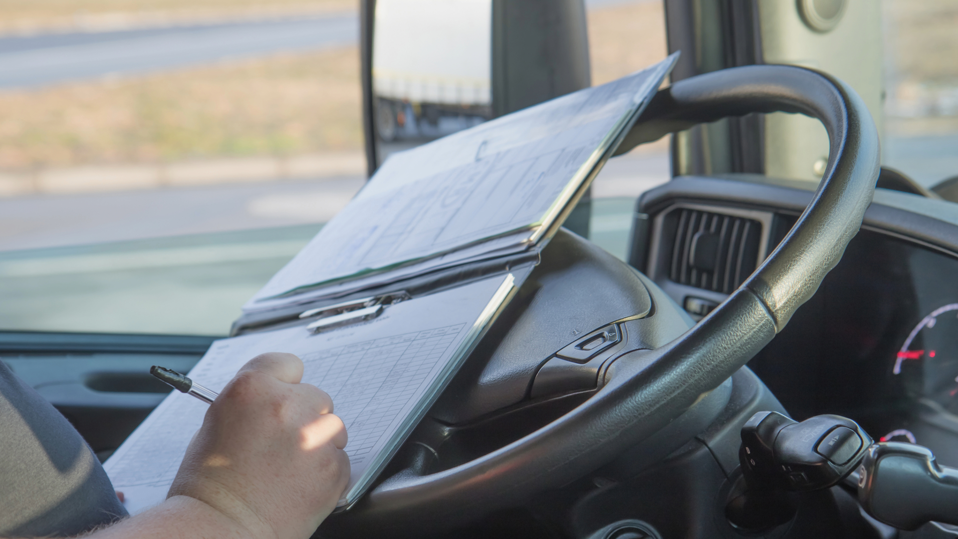 Manager checking on fleet management tips